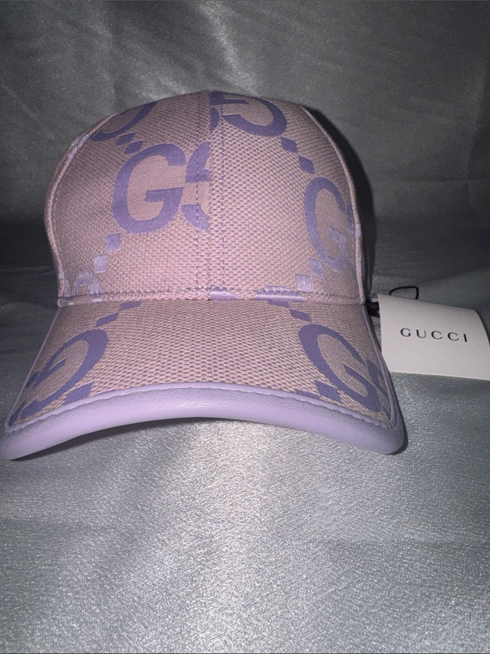 New! Gucci Jumbo GG canvas baseball hat in a light pink and purple colorway.